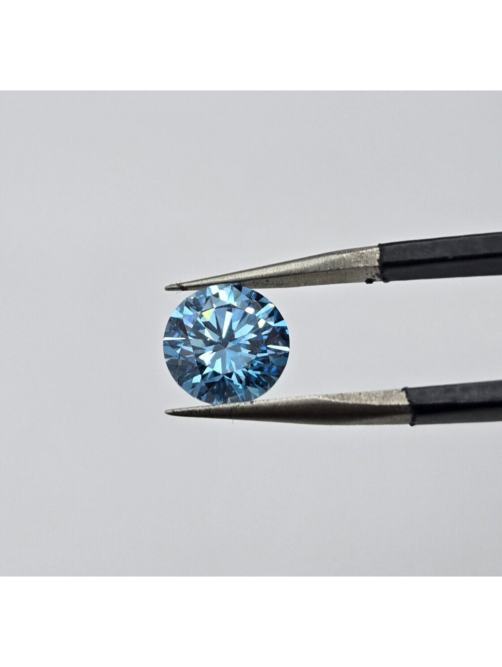 IGI 1.48CT Fancy Vivid Blue VS2 Lab Diamond Round Brilliant, USA IGI Certified
